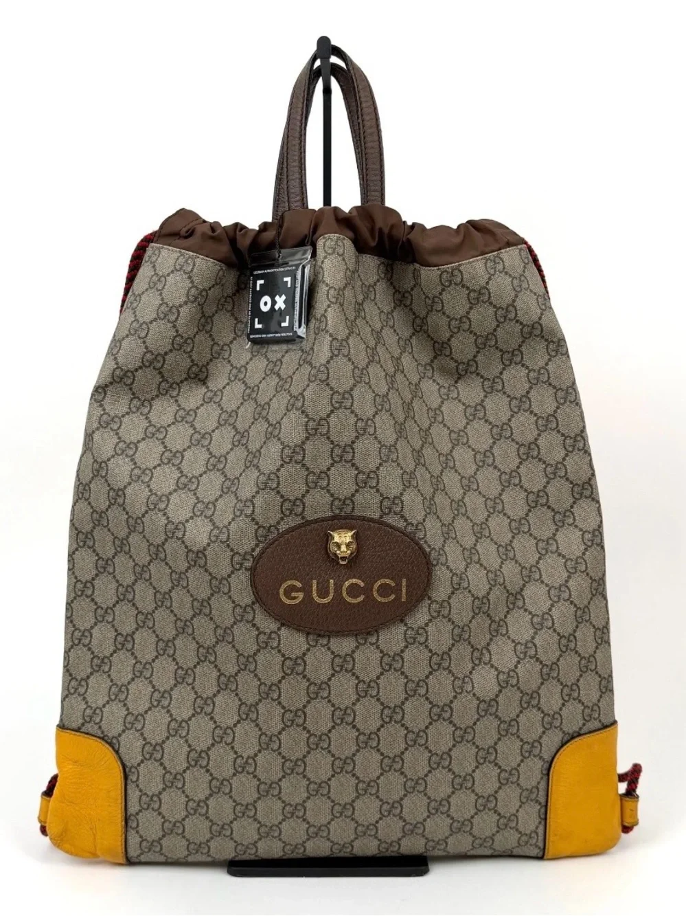 Pre Loved Gucci Beige GG Canvas Drawstring Backpack with Yellow Leather Accents